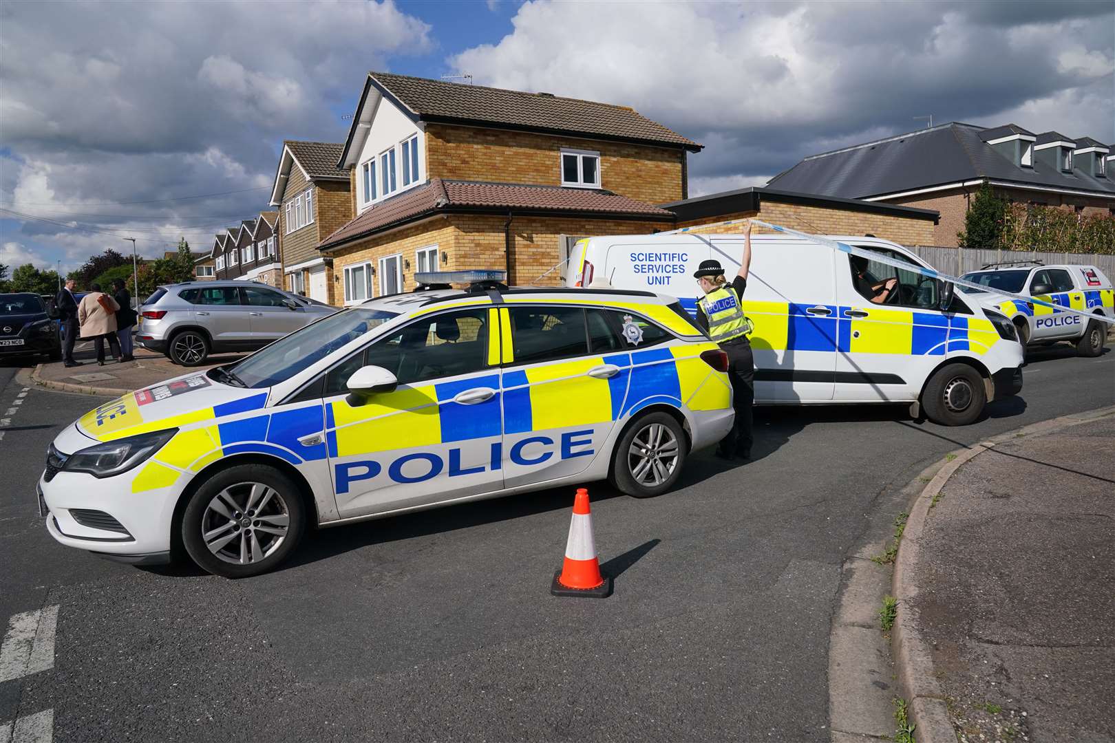 Police vehicles at the scene in Ashlyn Close, Bushey (Jonathan Brady/PA)