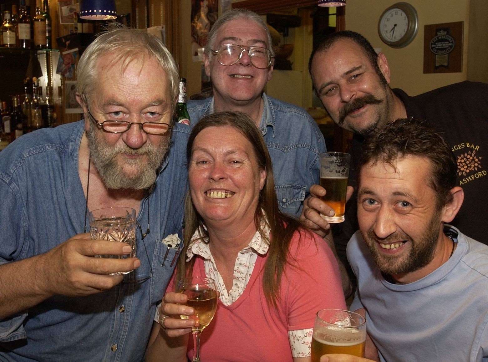 Stuart and Dee Barton with customers at The Oranges pub in 2005