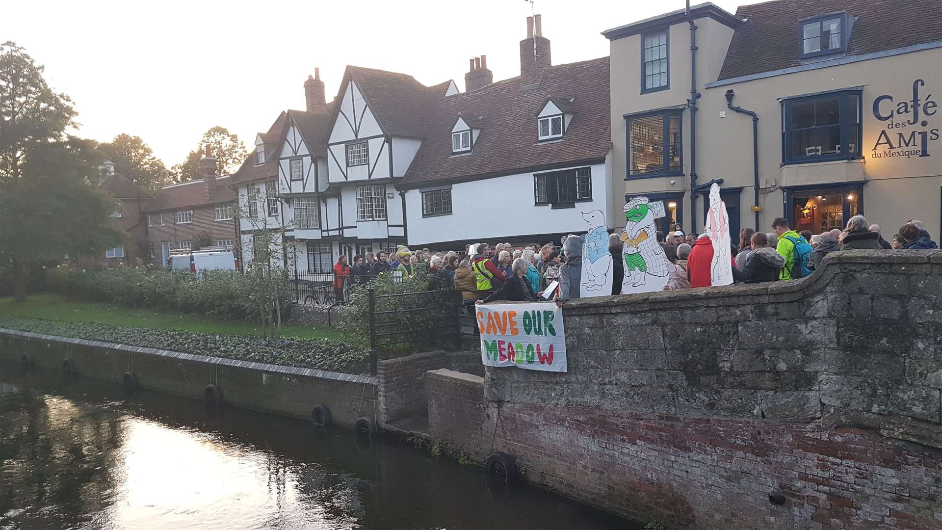 The protest group met outside Cafe des Amis before heading into the Guildhall