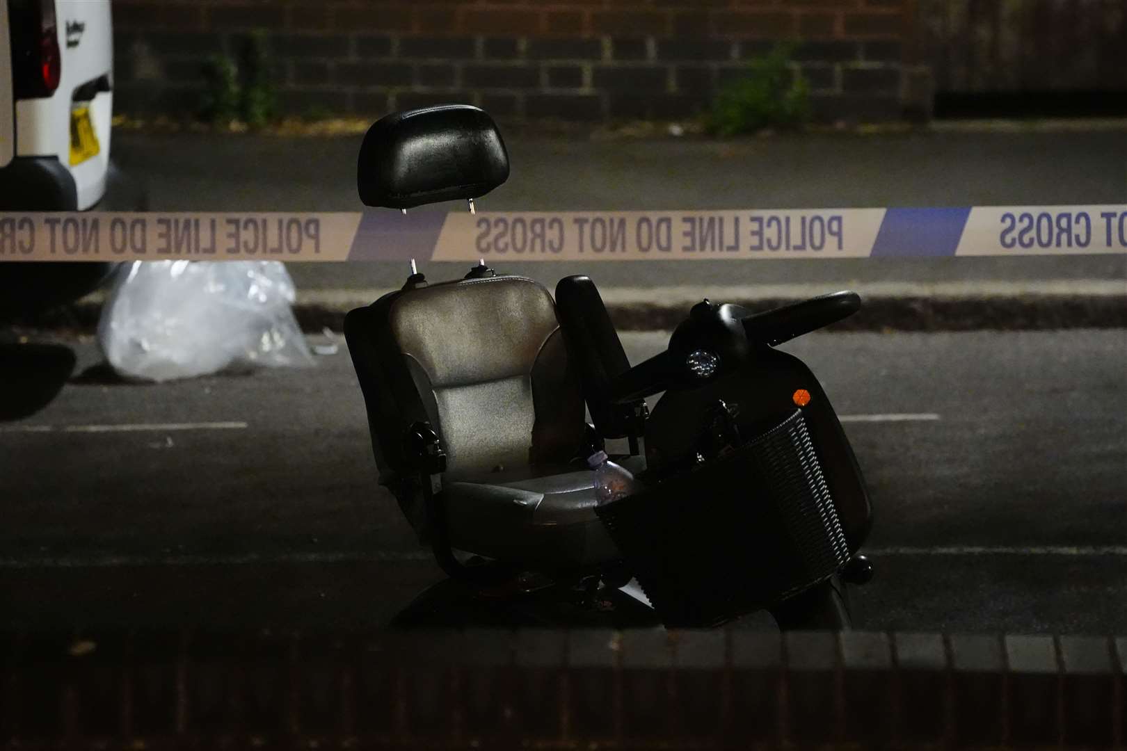 A black and grey electric wheelchair on Overbury Street near the scene in Rushmore Road, Clapton, east London (Aaron Chown/PA)