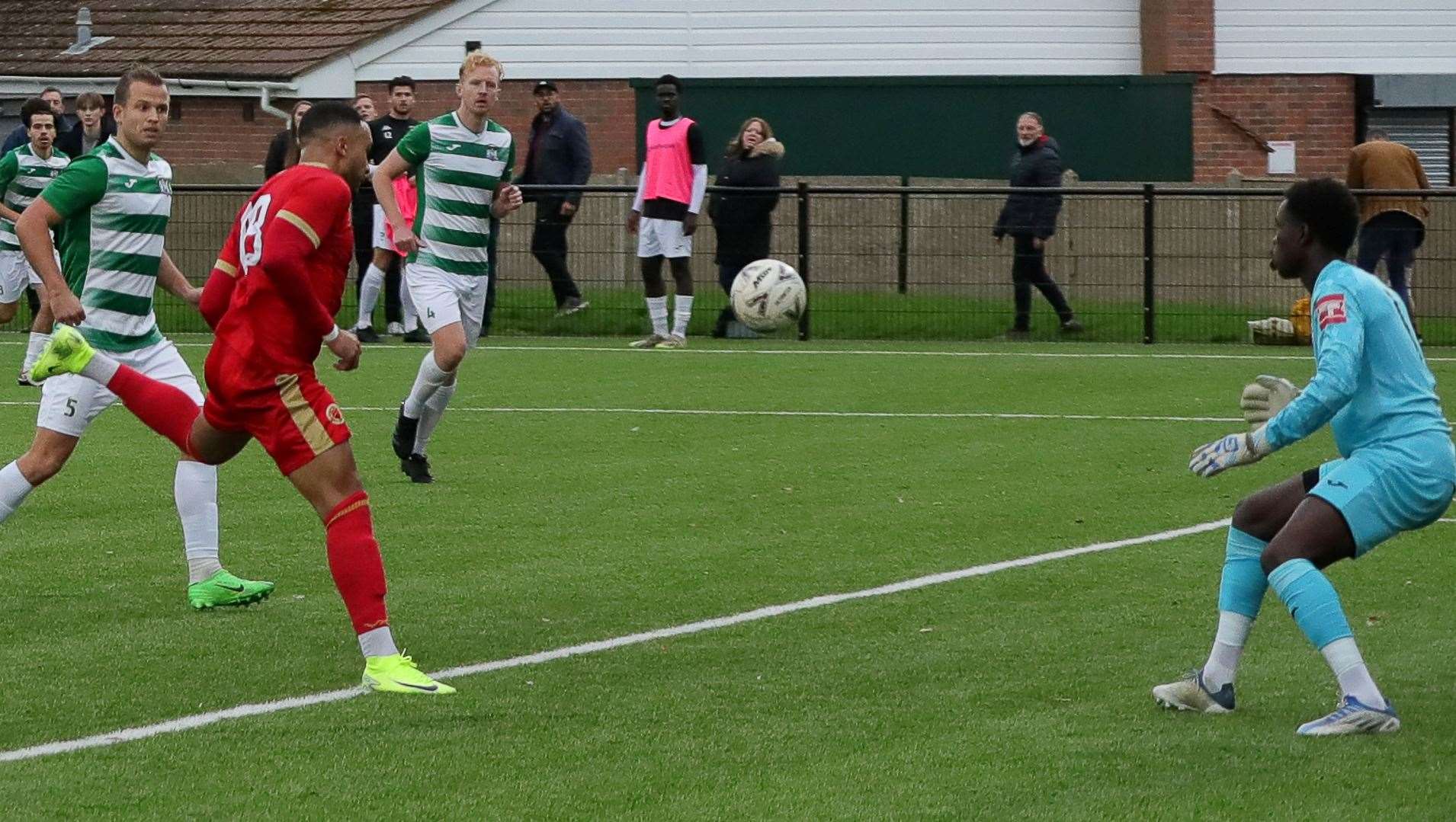 Dean Grant fires the ball past Corinthian keeper Nathan Boamah for the first goal. Picture: Les Biggs