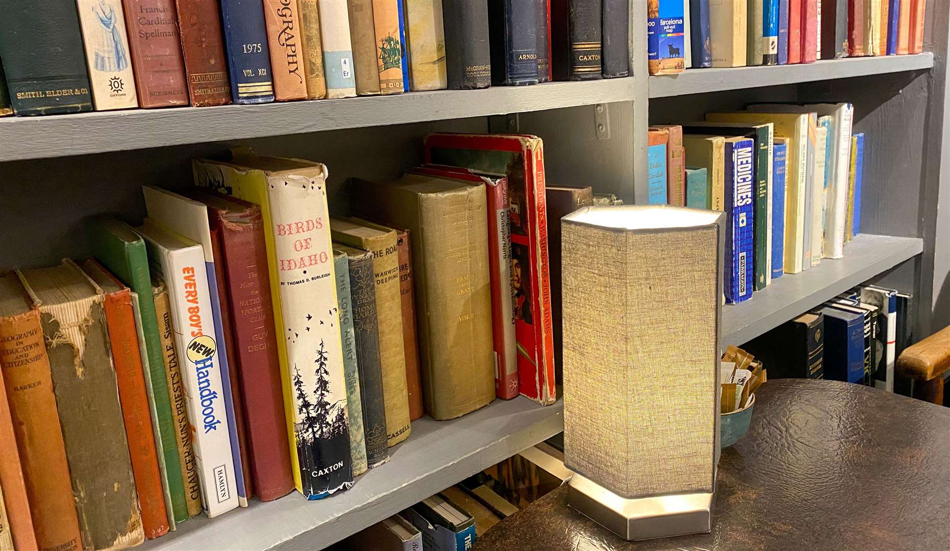 Our table, and the entire cafe, was surrounded by bookshelves stacked with second-hand books. Picture: Sam Lawrie