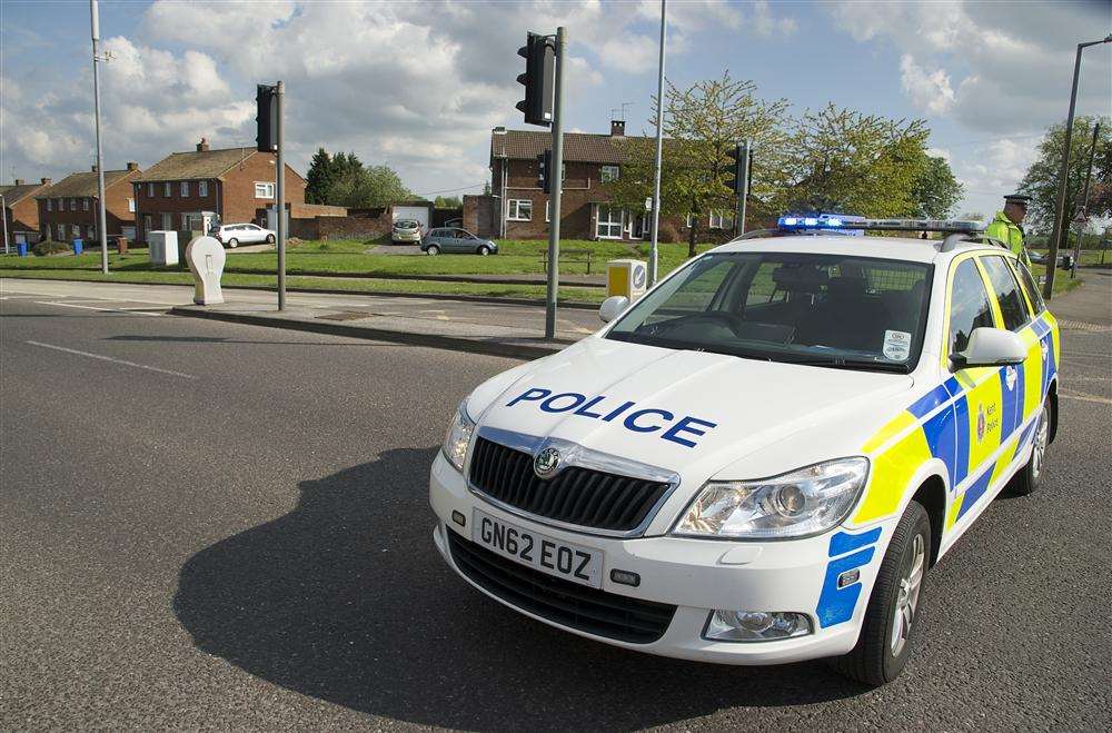 A police car at the crash scene