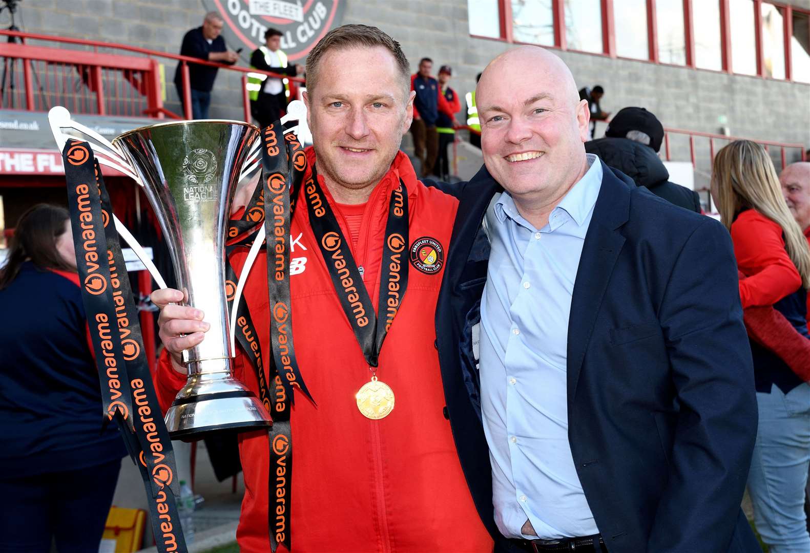 Dennis Kutrieb celebrates Ebbsfleet’s 2022/23 National League South title win with chief executive Damian Irvine. Picture: Simon Hildrew