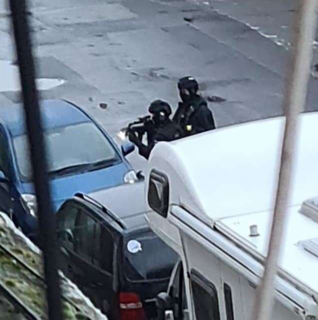 Armed police enter a house in Alma Road, Sheerness