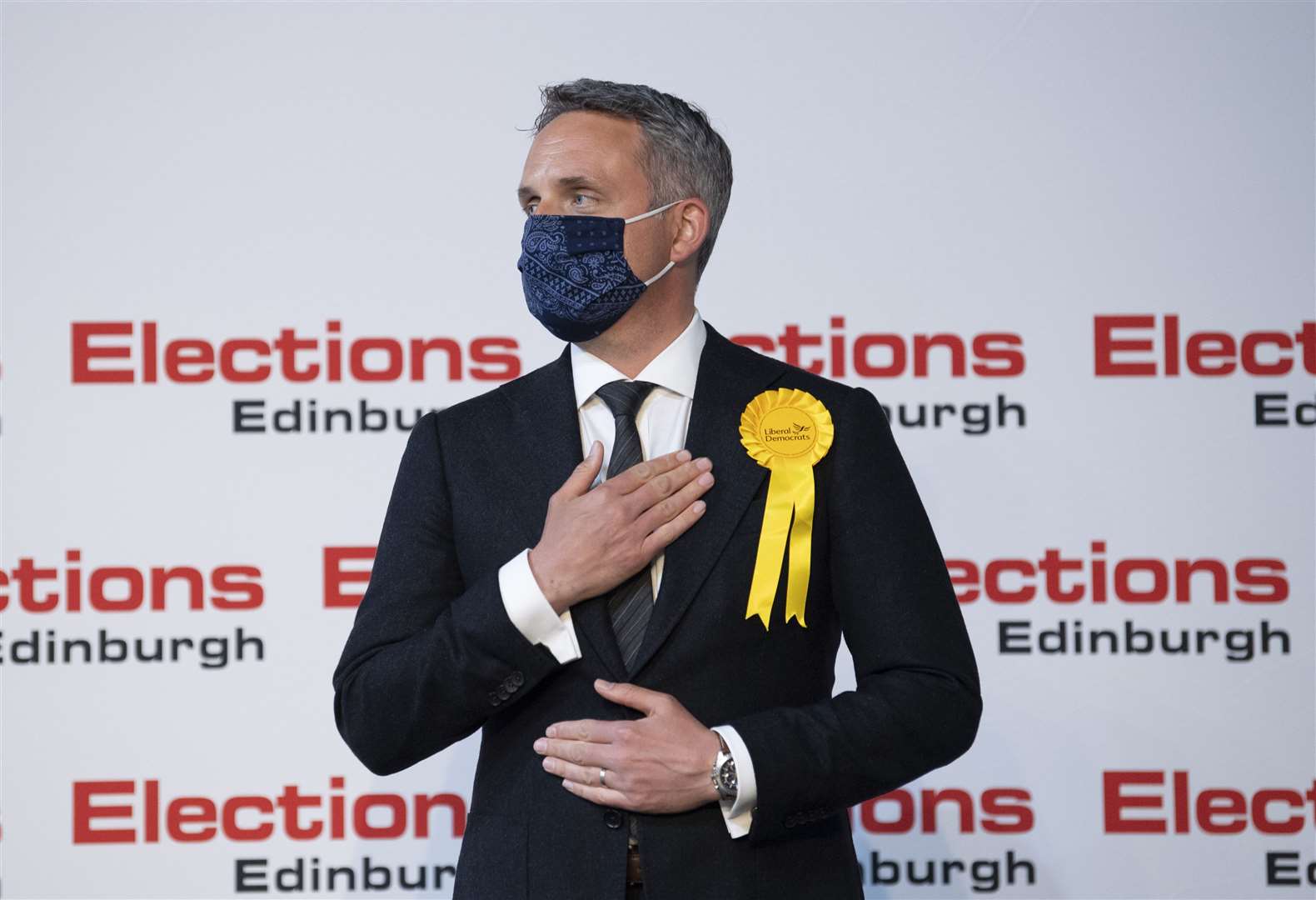 Liberal Democrat candidate Alex Cole Hamilton reacts as he holds his seat for Edinburgh Western at the Holyrood elections (Lesley Martin/PA)