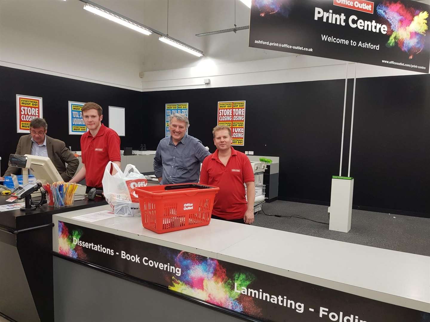 Store manager Simon Barker with his colleagues (12091039)