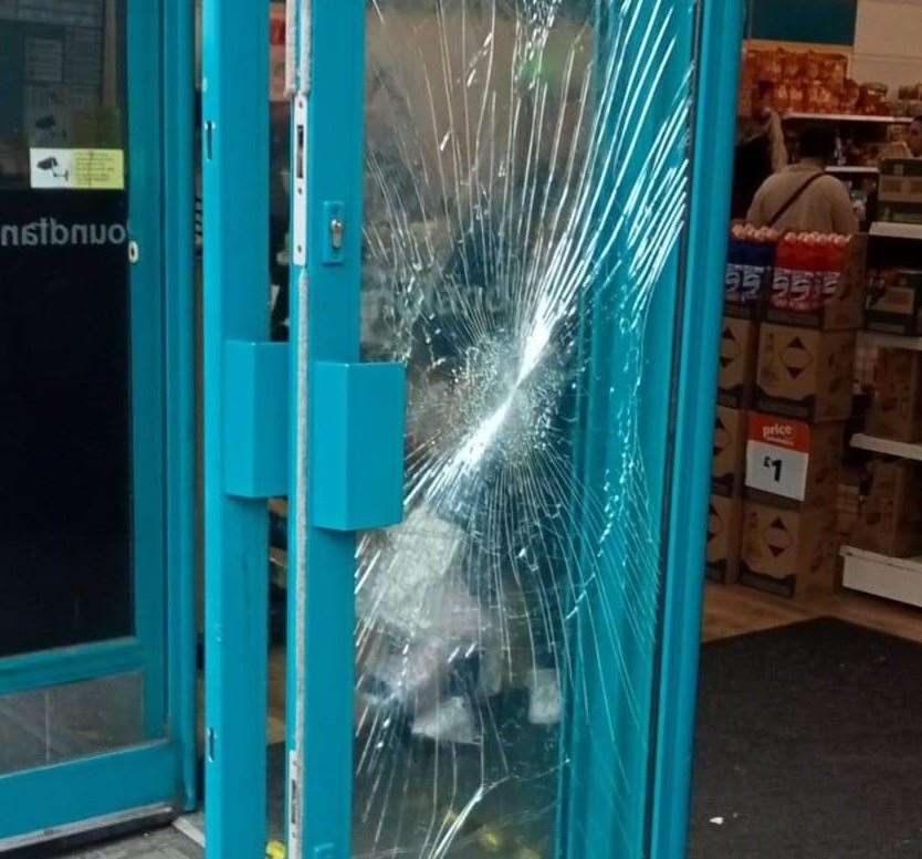 Poundland in Week Street, Maidstone, had its door windows smashed. Picture: Alan Russell