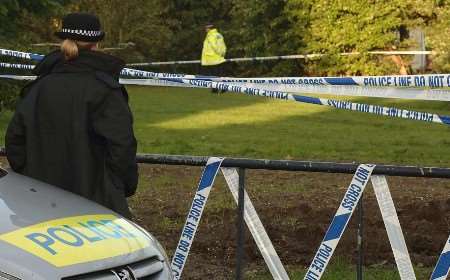 Police officers near the scene where the body was discovered. Picture: GRANT FALVEY