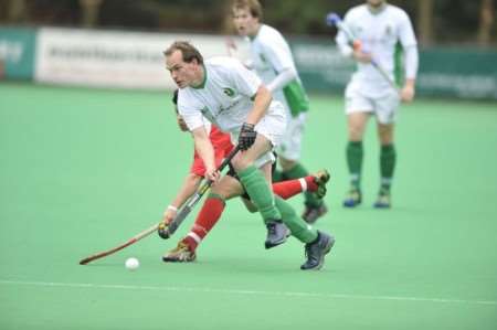 Canterbury (white) go on the attack against Holcombe at Polo Farm. Picture: Barry Goodwin