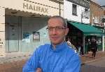 Simon Reynolds protesting against plans for a coffe shop next door