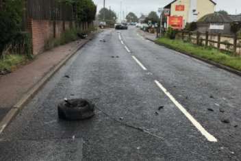 Debris in the road following the crash. Picture: @Kentpoliceroads.