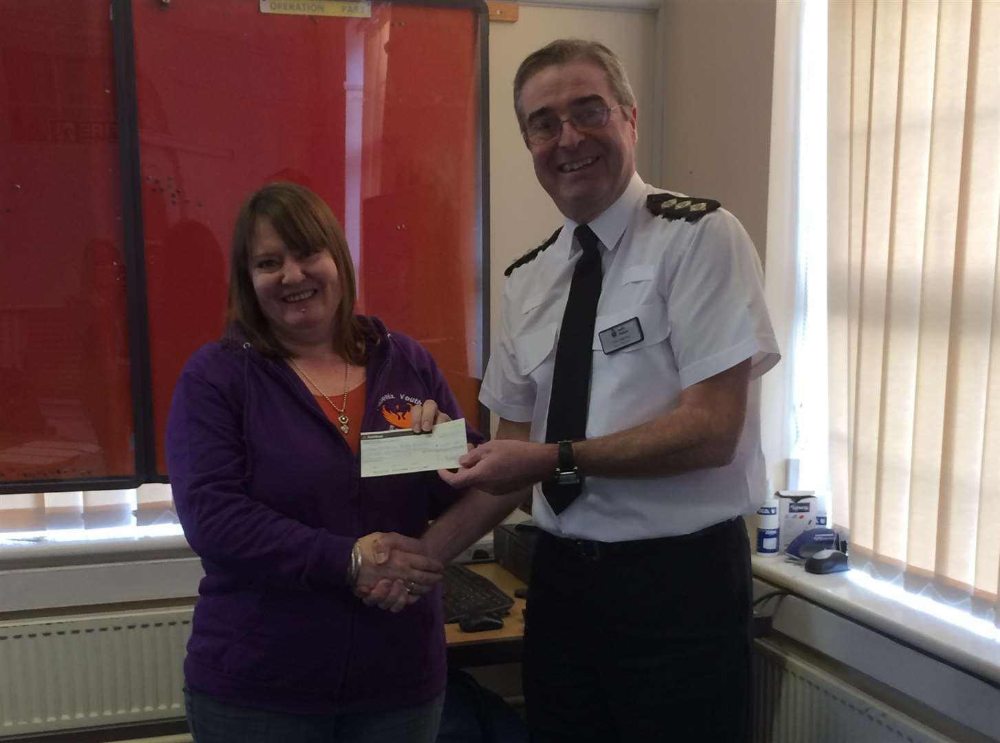 District commander ch insp Steve Barlow with Elleanor Scott of the Phoenix Youth Project