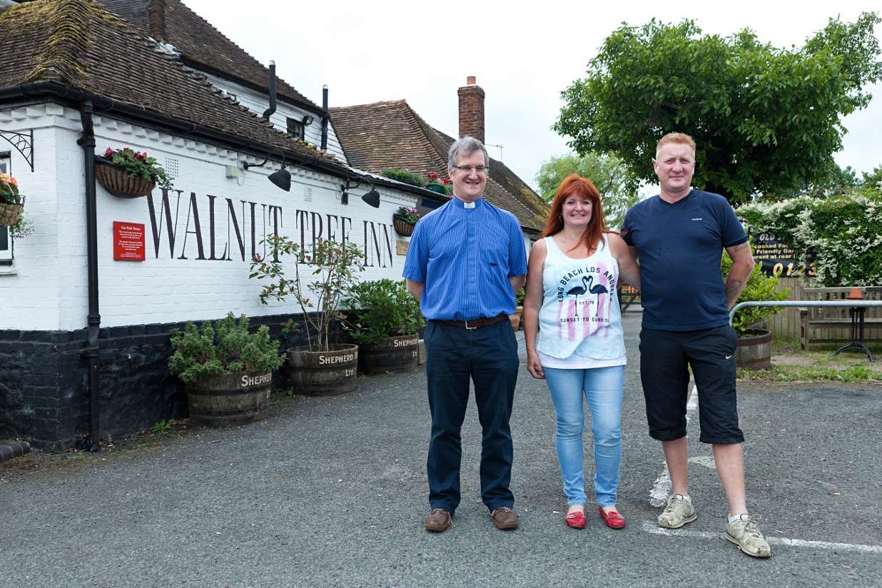 The Reverend Martin Jones with landlady Karen Barrett and her partner Steve Worrow