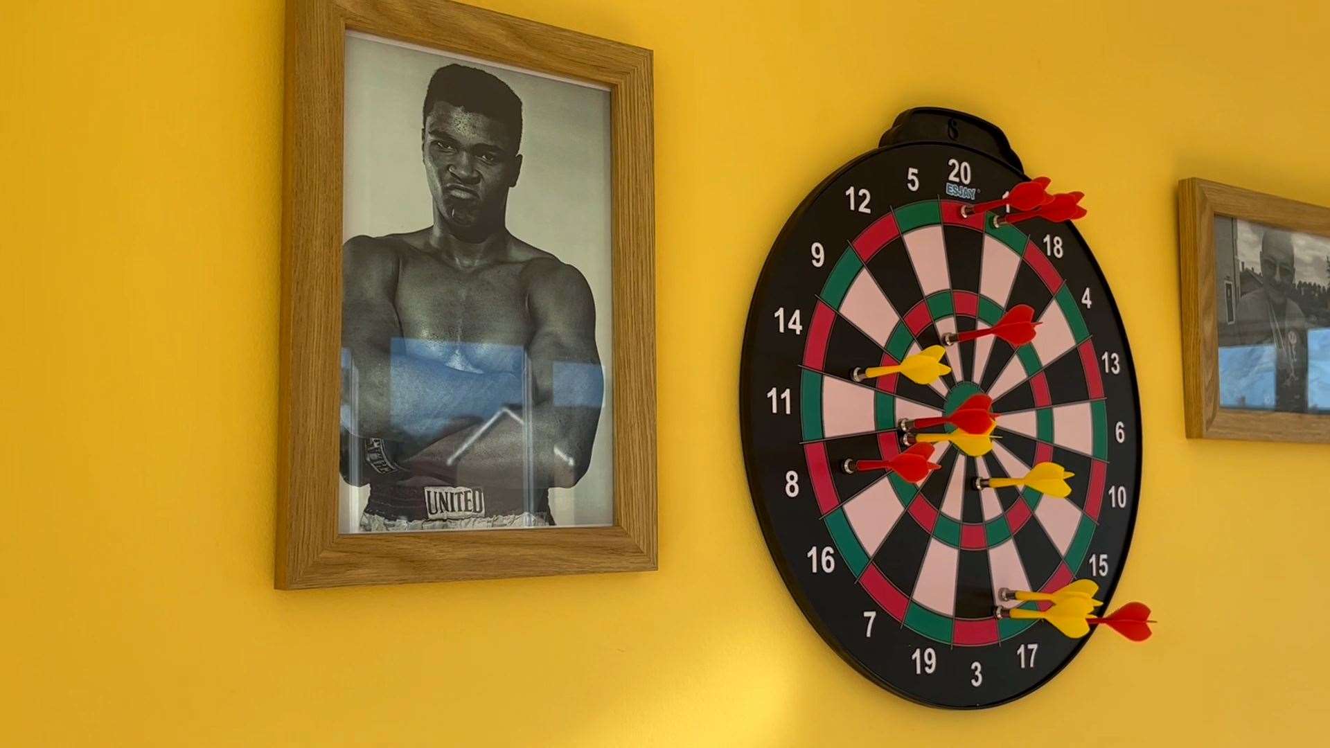 A sports area at the home where residents can engage in games such as darts