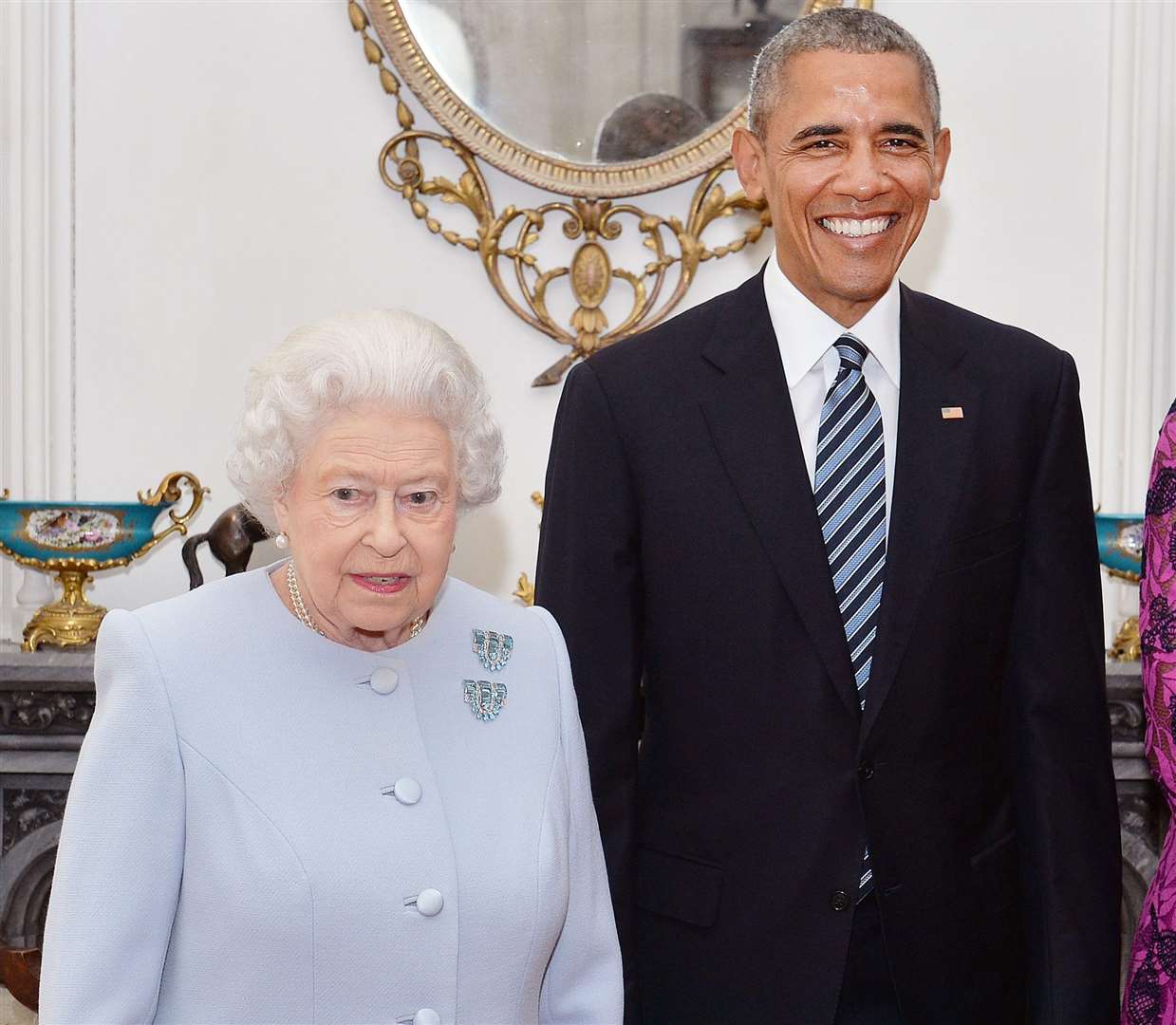 The Queen wearing her aquamarine and diamond clips at her 90th birthday lunch with Barack Obama in 2016 (John Stillwell/PA)