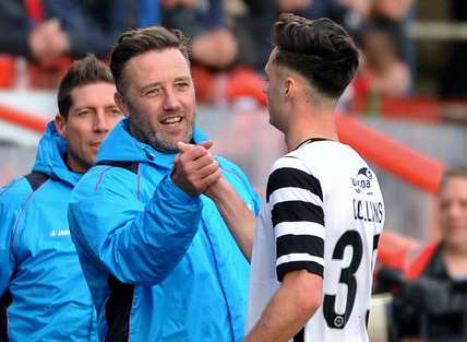 Jay Saunders with goalscorer Aaron Collins Picture: Steve Terrell