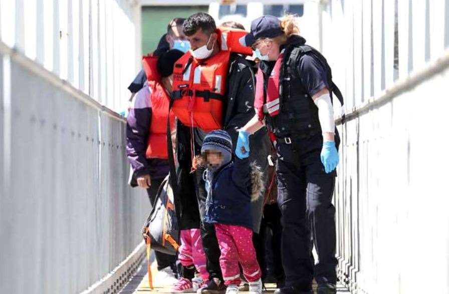 People arrive in Dover following a small boat incident in the Channel. Picture: Gareth Fuller/PA