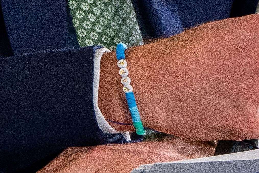 The Prince of Wales wore a friendship bracelet bearing the word ‘Papa’, made by his daughter, Princess Charlotte, during a visit to Cape Town (Aaron Chown/PA)