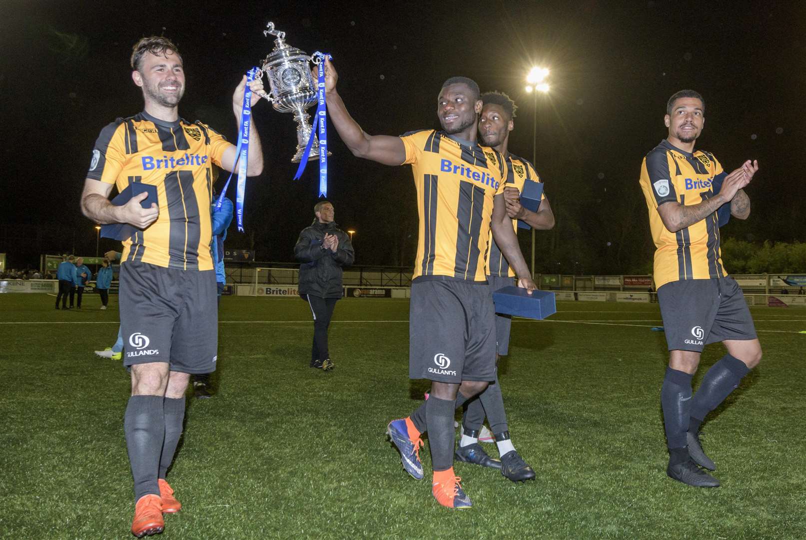 Joe Anderson, Seth Nana Twumasi, Blair Turgott and Alex Wynter celebrate Maidstone's victory Picture: Andy Payton