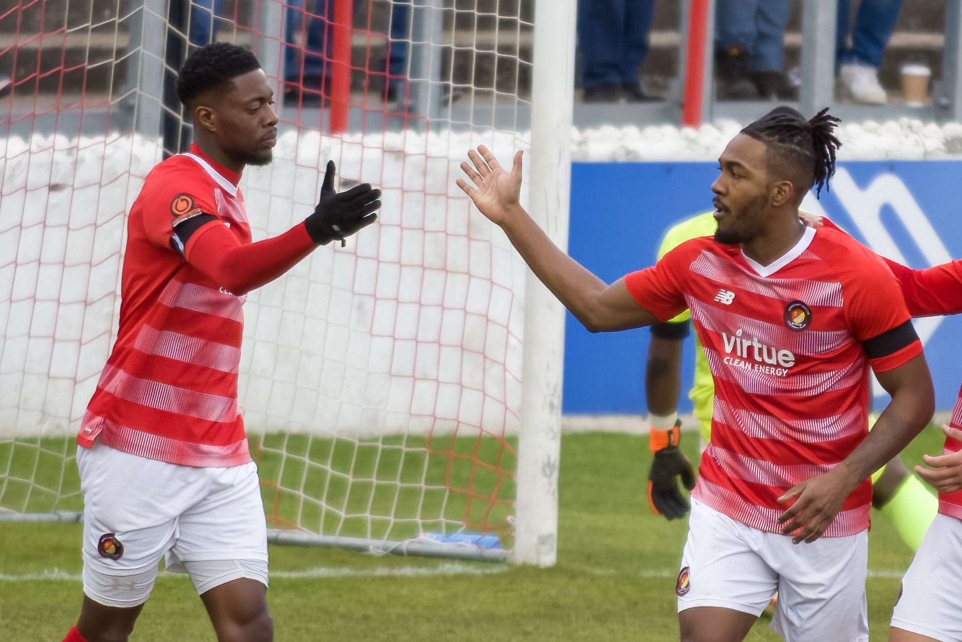 Rakish Bingham, left, and Dominic Poleon celebrate one of their 45 goals this season. Picture: Ed Miller/EUFC