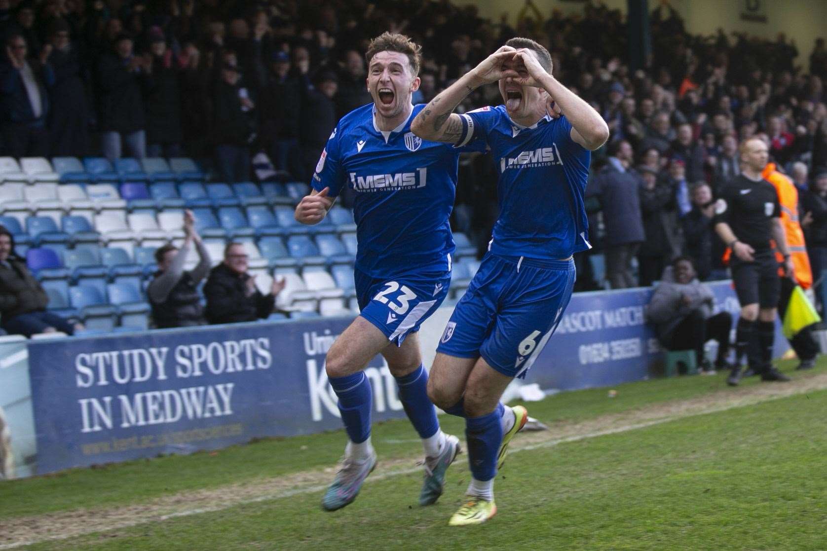 Shaun Williams celebrates scoring the winner for Gillingham against Carlisle