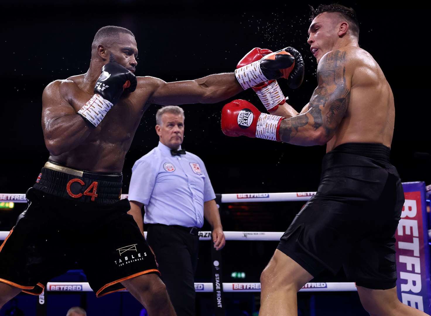 Gravesend's Cheavon Clarke lands a blow against Vasil Ducar. Picture: Mark Robinson / Matchroom Boxing