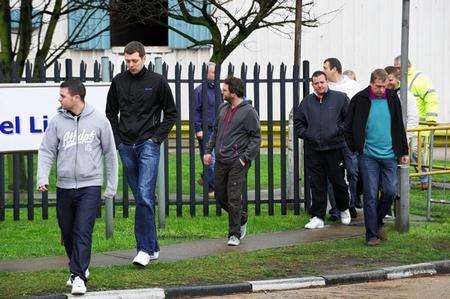 Thamesteel workers leaving the mill after the announcement it was going into administration