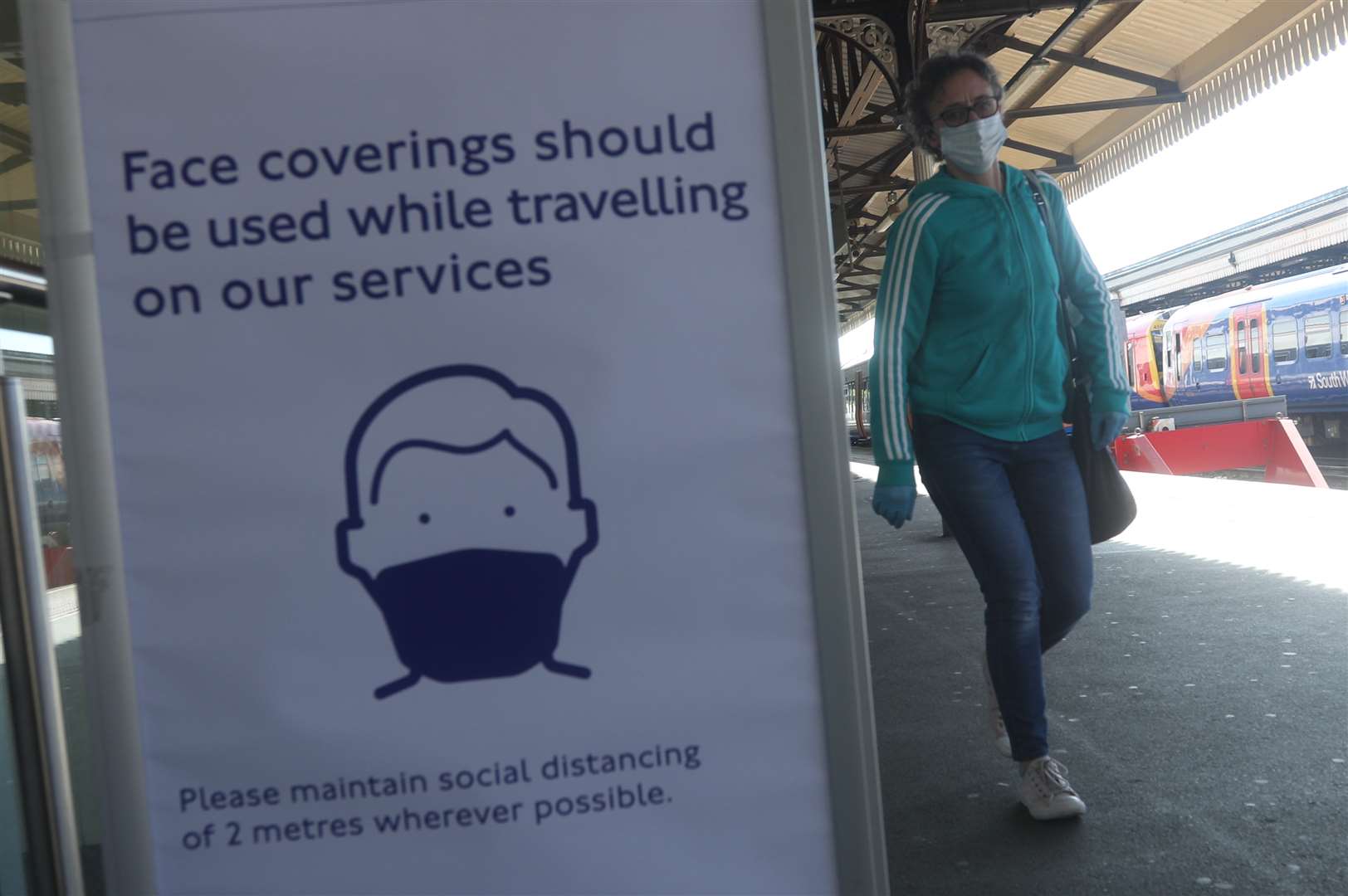 Most passengers are wearing face coverings (Yui Mok/PA)