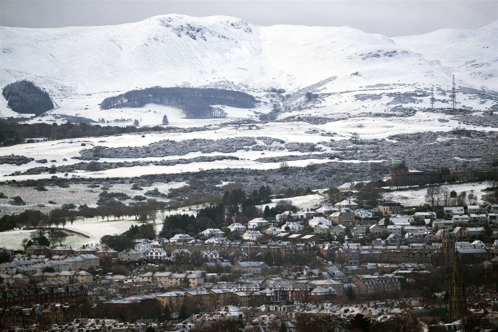 The south of Edinburgh and the Pentland Hills were sprinkled with snow, while temperatures in some parts of Scotland dropped as low as minus 7C (19F) overnight (Jane Barlow/PA)