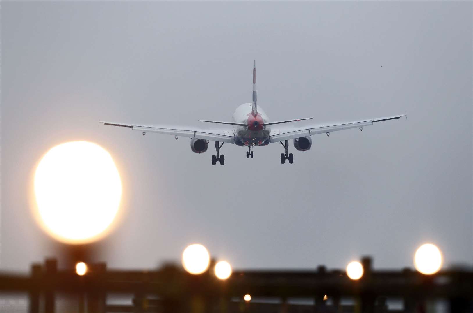 A plane landing at Gatwick Airport (Gareth Fuller/PA)