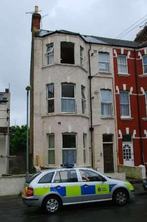 Police at house where body was found