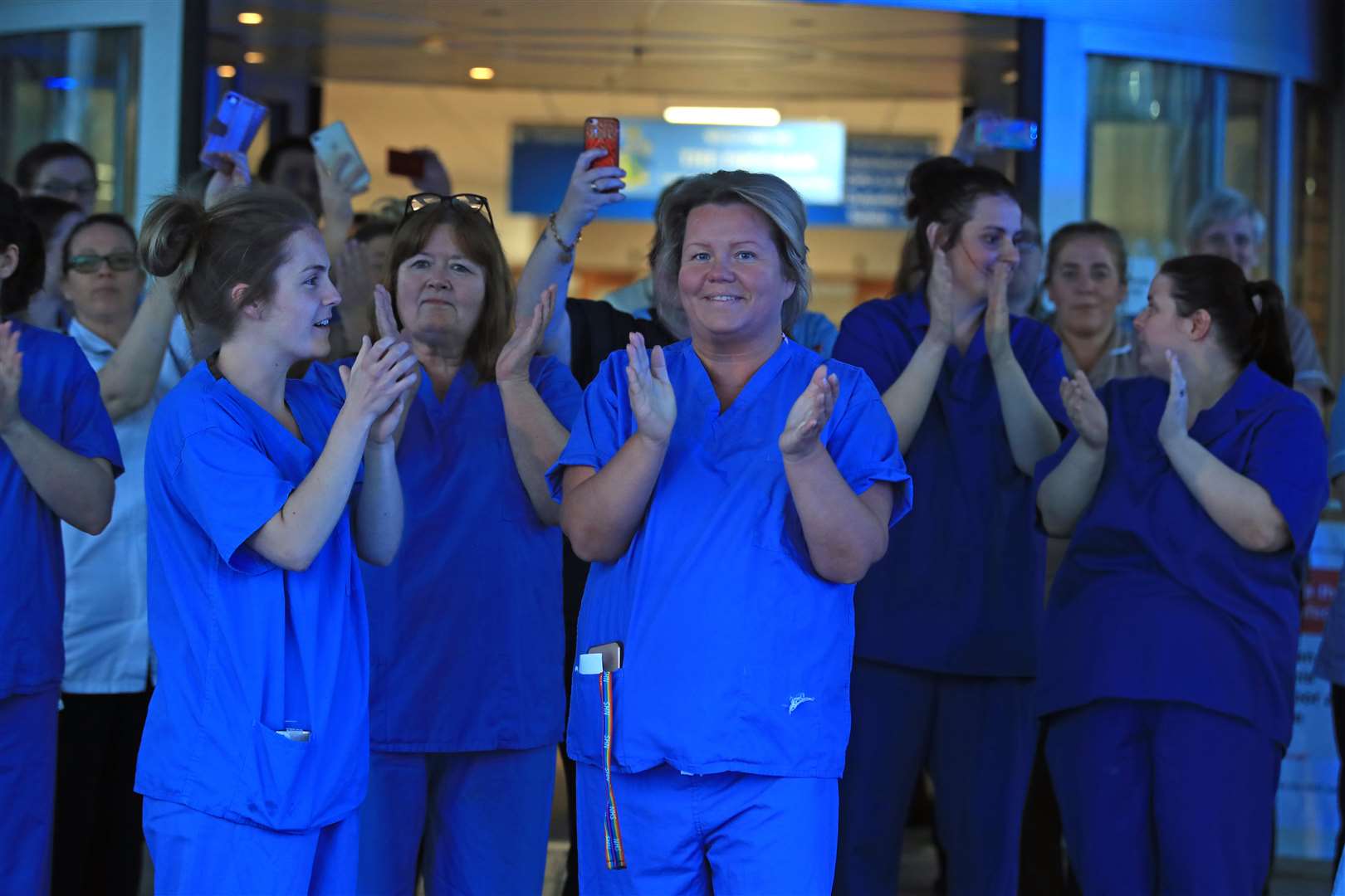 Staff join in the applause at the Freeman Hospital in Newcastle-upon-Tyne to salute local heroes during Thursday’s nationwide Clap for Carers (Owen Humphreys/PA)