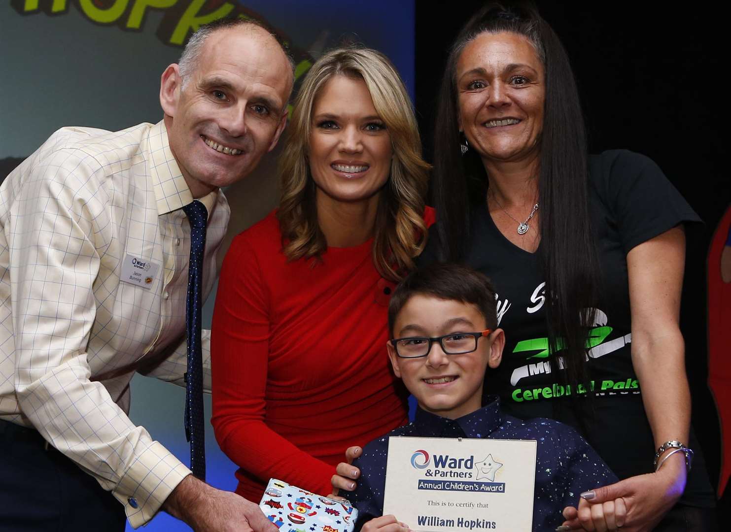 Ward and Partners Annual Children's Awards Going for Gold winner William Hopkins with Senior Director of Lettings Jason Bunning & Charlotte Hawkins..Mercure Great Danes Hotel in Maidstone. Picture: Andy Jones.