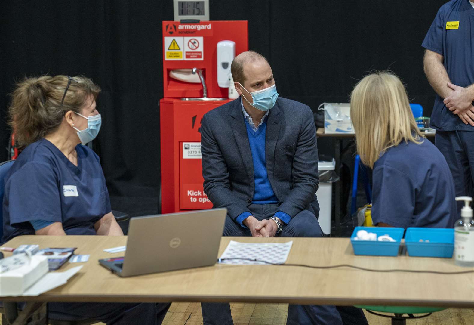 The Duke of Cambridge speaks to staff during his visit to the King’s Lynn Corn Exchange Vaccination Centre (Arthur Edwards/The Sun/PA)