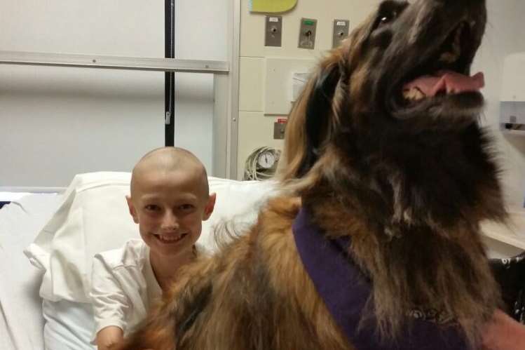 Jack Howard in his LA hospital bed with a special visitor