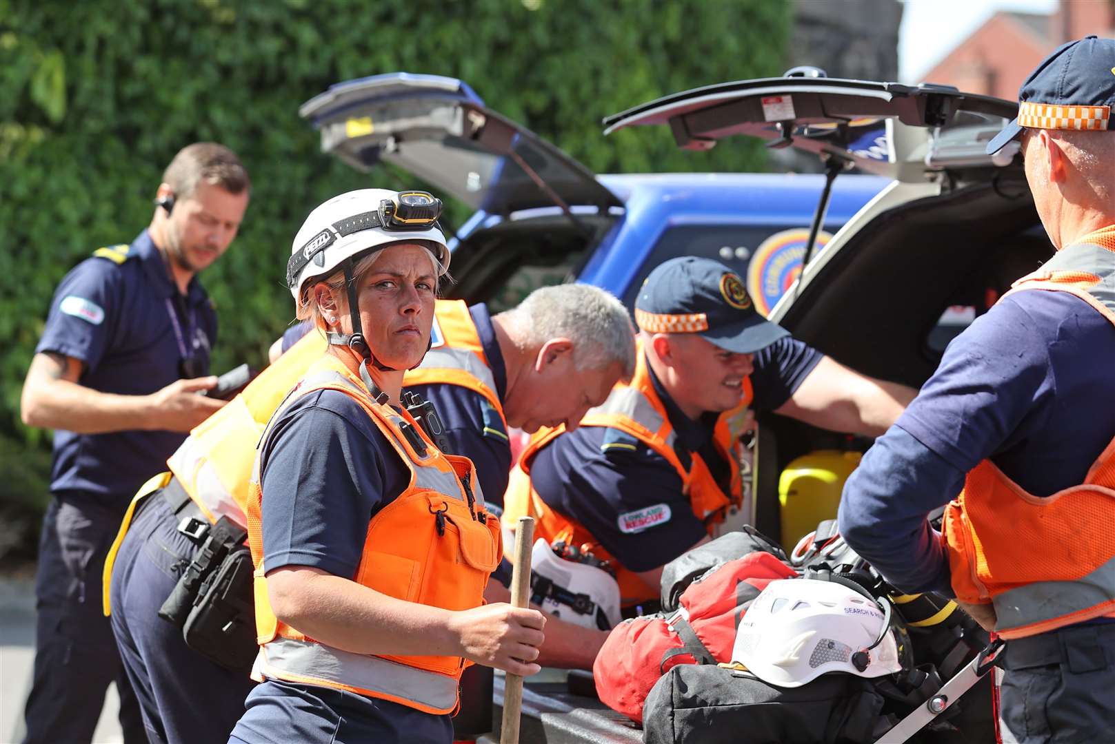 Search and Rescue teams at Braidwater Retail Park in Ballymena on Friday (Liam McBurney/PA)