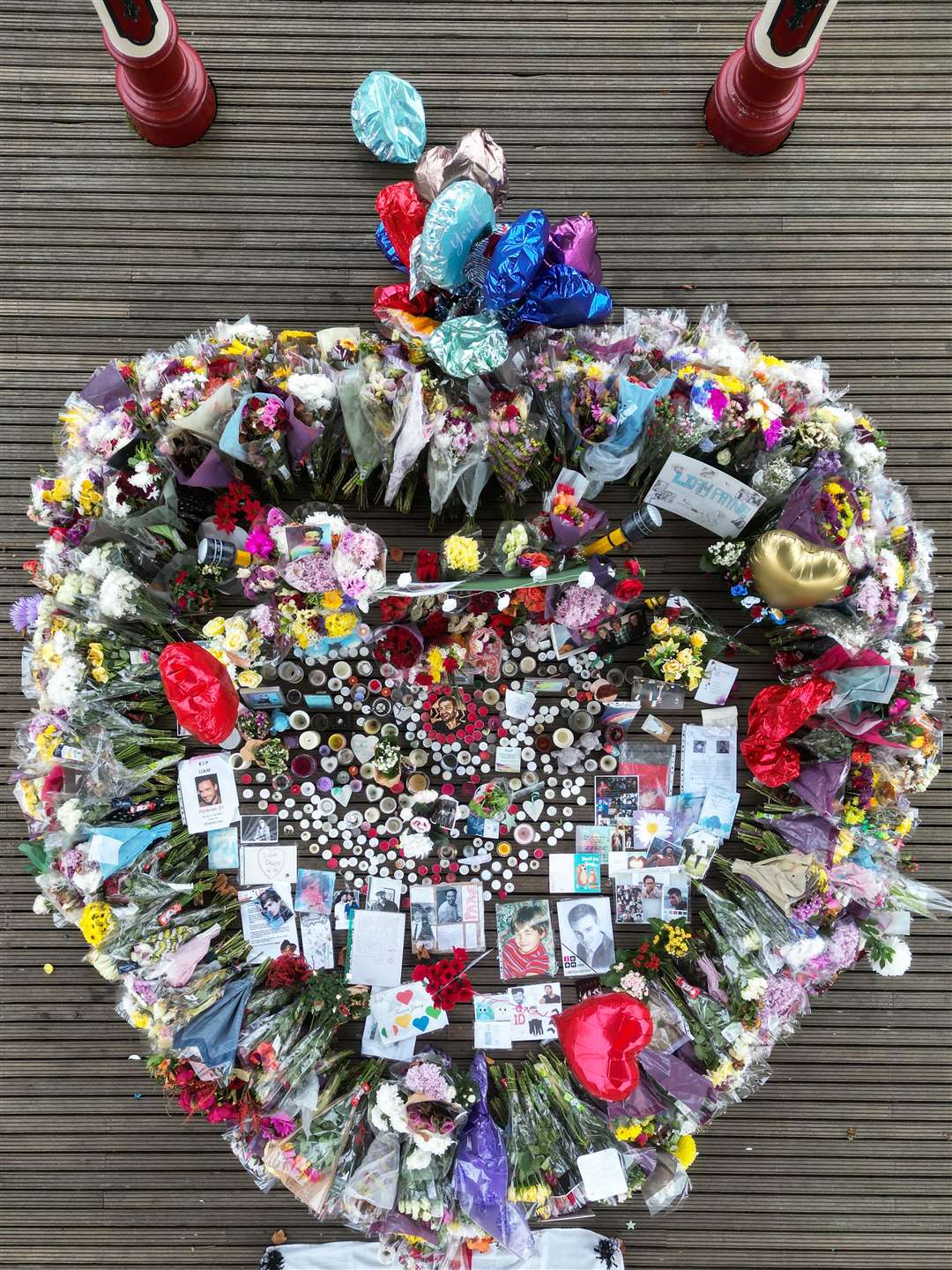 Floral tributes to singer Liam Payne which have been moved by authorities to West Park in his hometown of Wolverhampton (Jacob King/PA)