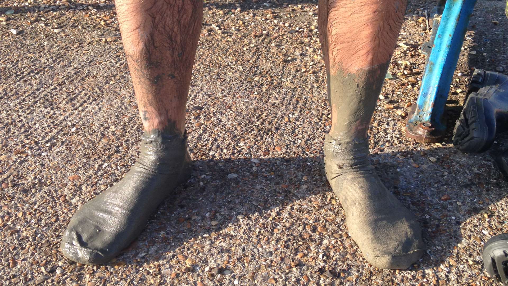 Pedro Costa, 46, walked out onto the mud to meet a friend on his boat