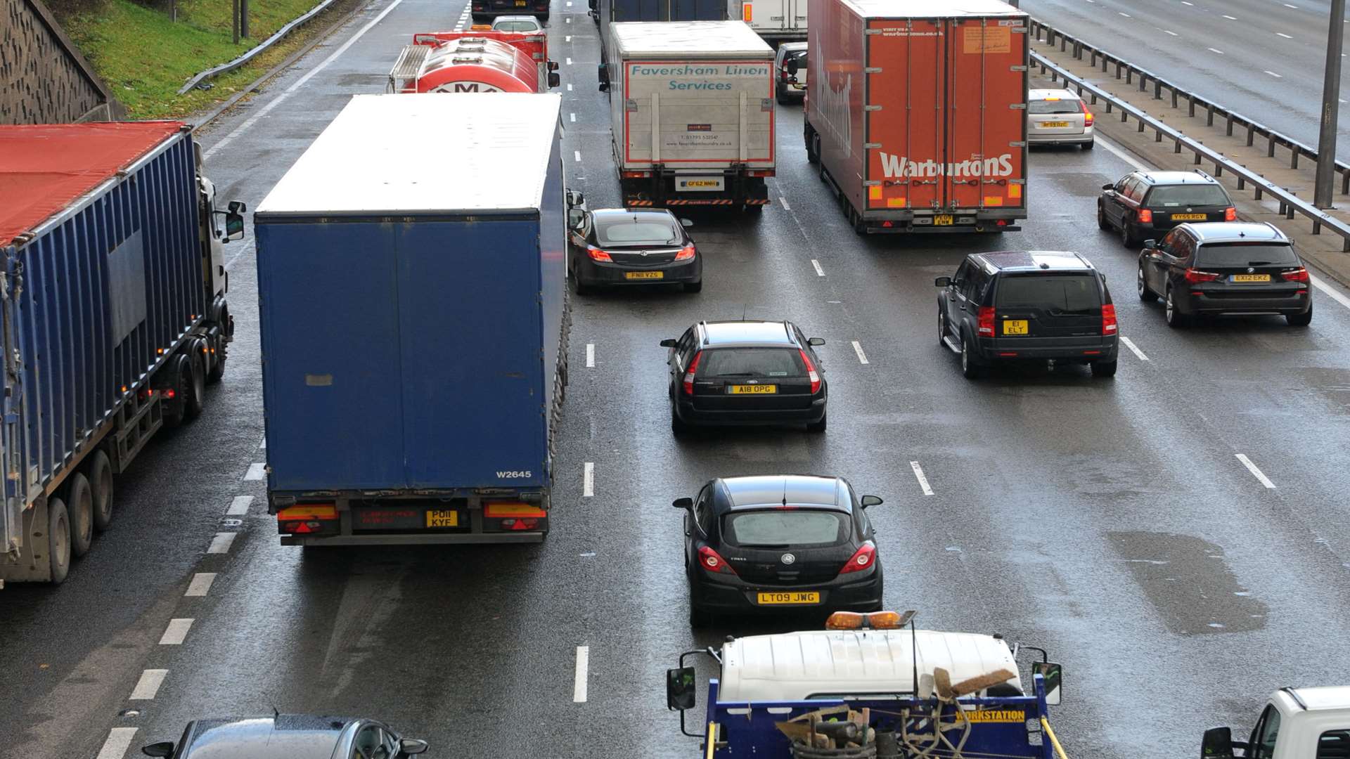 Traffic queuing on a motorway. Stock image.