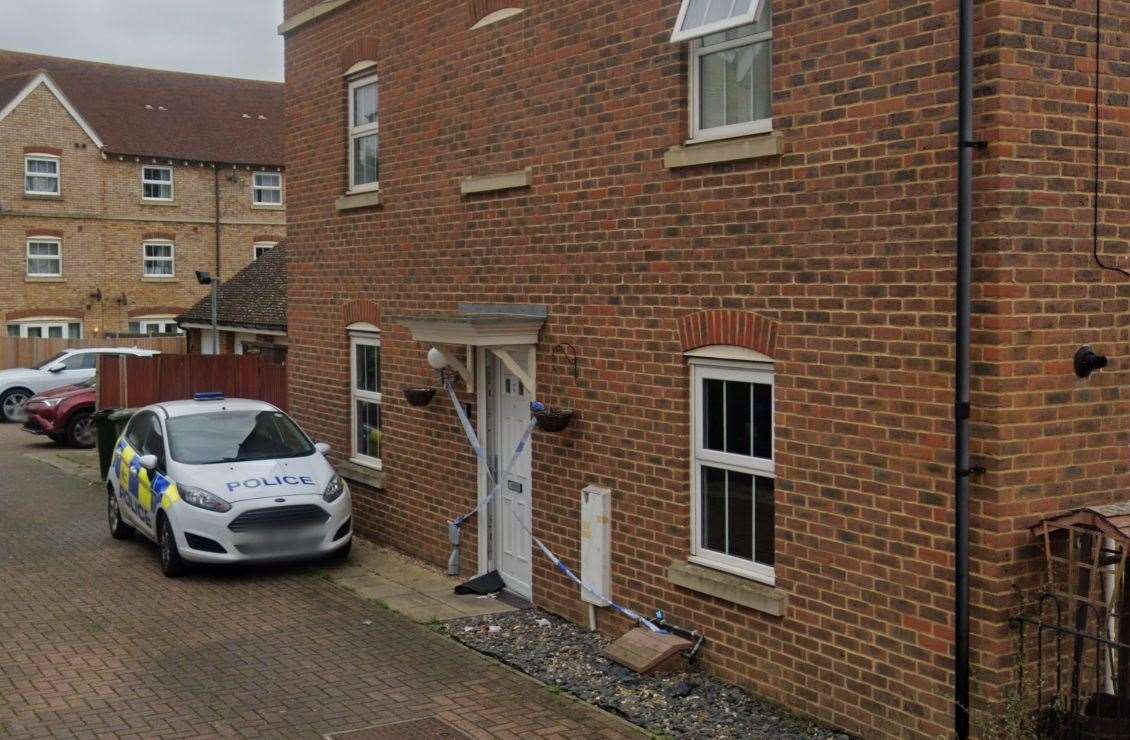 A police car and police tape outside 20 Leigh Road in Great Easthall in October 2022. Picture: Google Maps