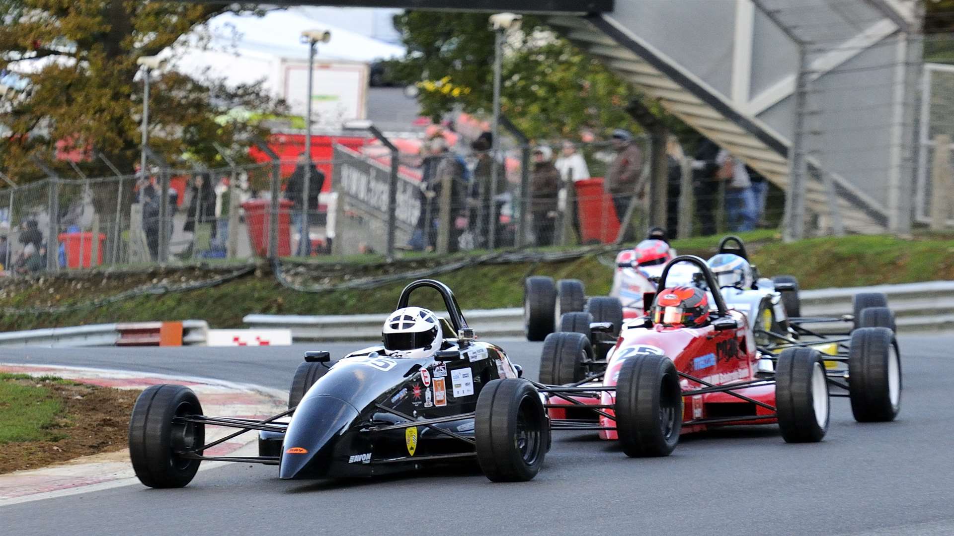 Foster chased by Maclennan in the final. Picture: Simon Hildrew