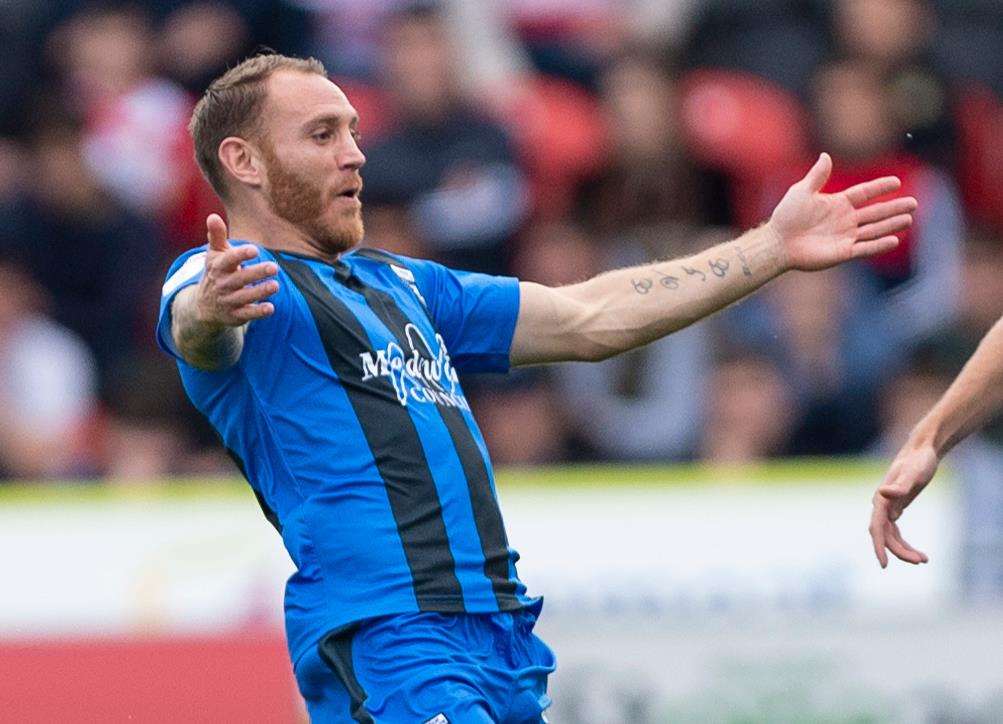 Gillingham defender Barry Fuller celebrates his wonder goal at Doncaster Picture: Ady Kerry