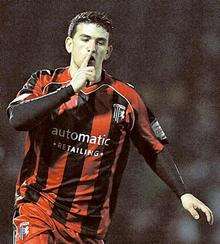 Cody McDonald celebrates after scoring Gillingham's second goal