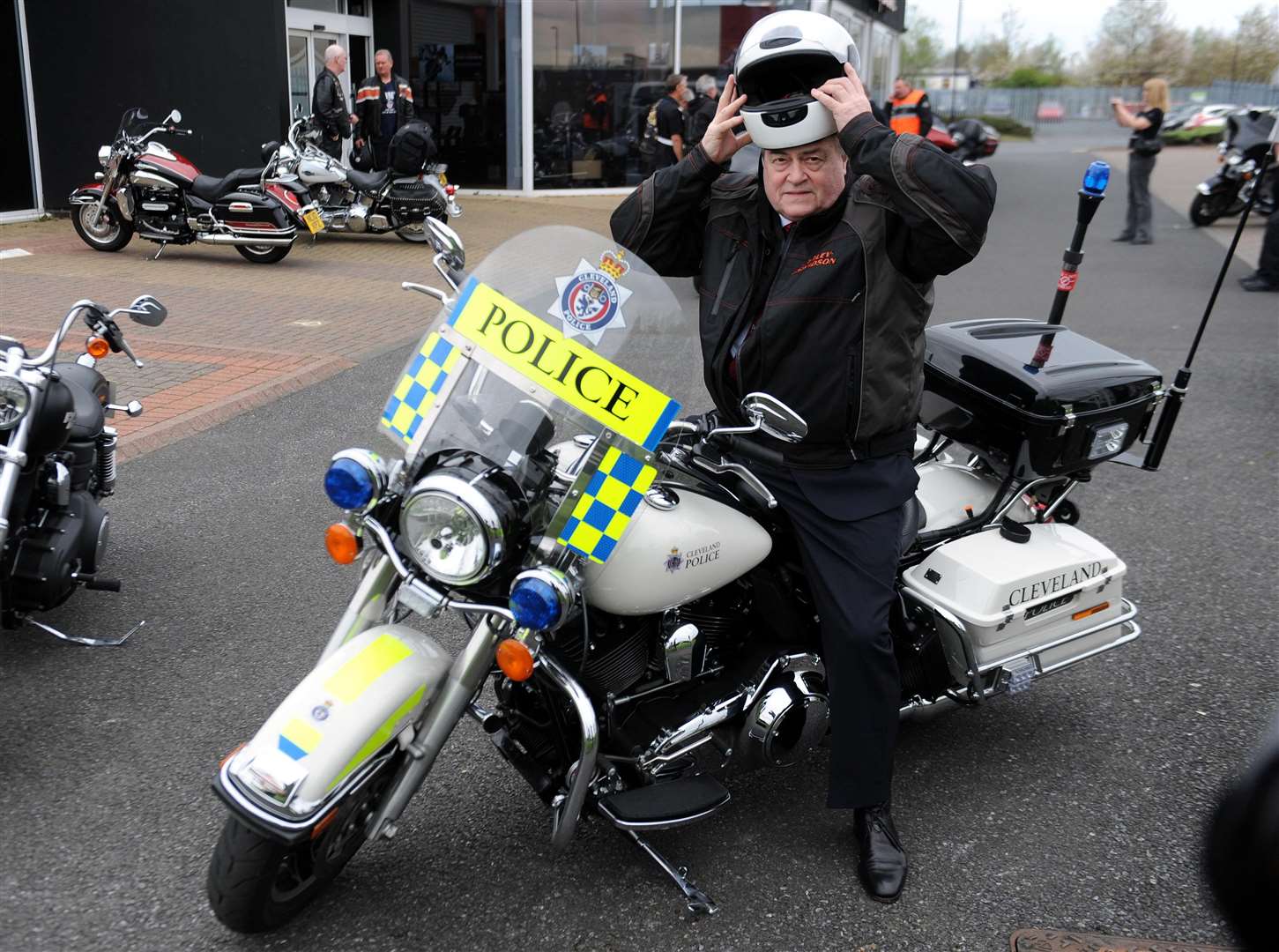 John Prescott saddles a Police Harley Davidson at the opening of the new Harley Davidson garage in North Tyneside (Owen Humphreys/PA)