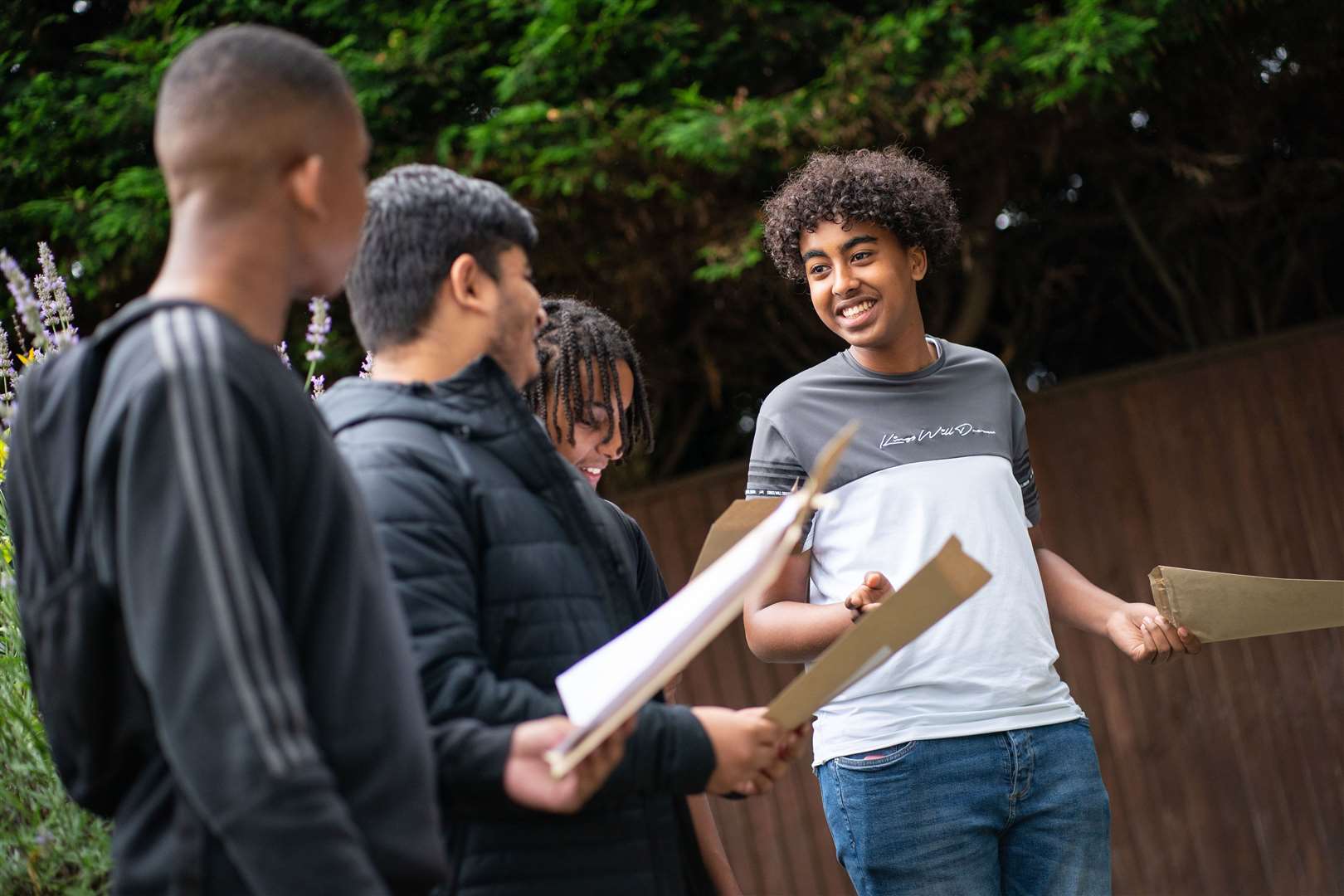 Noah Jama, right, said he and his classmates worked ‘through thick and thin’ to achieve their grades (Dominic Lipinski/PA)