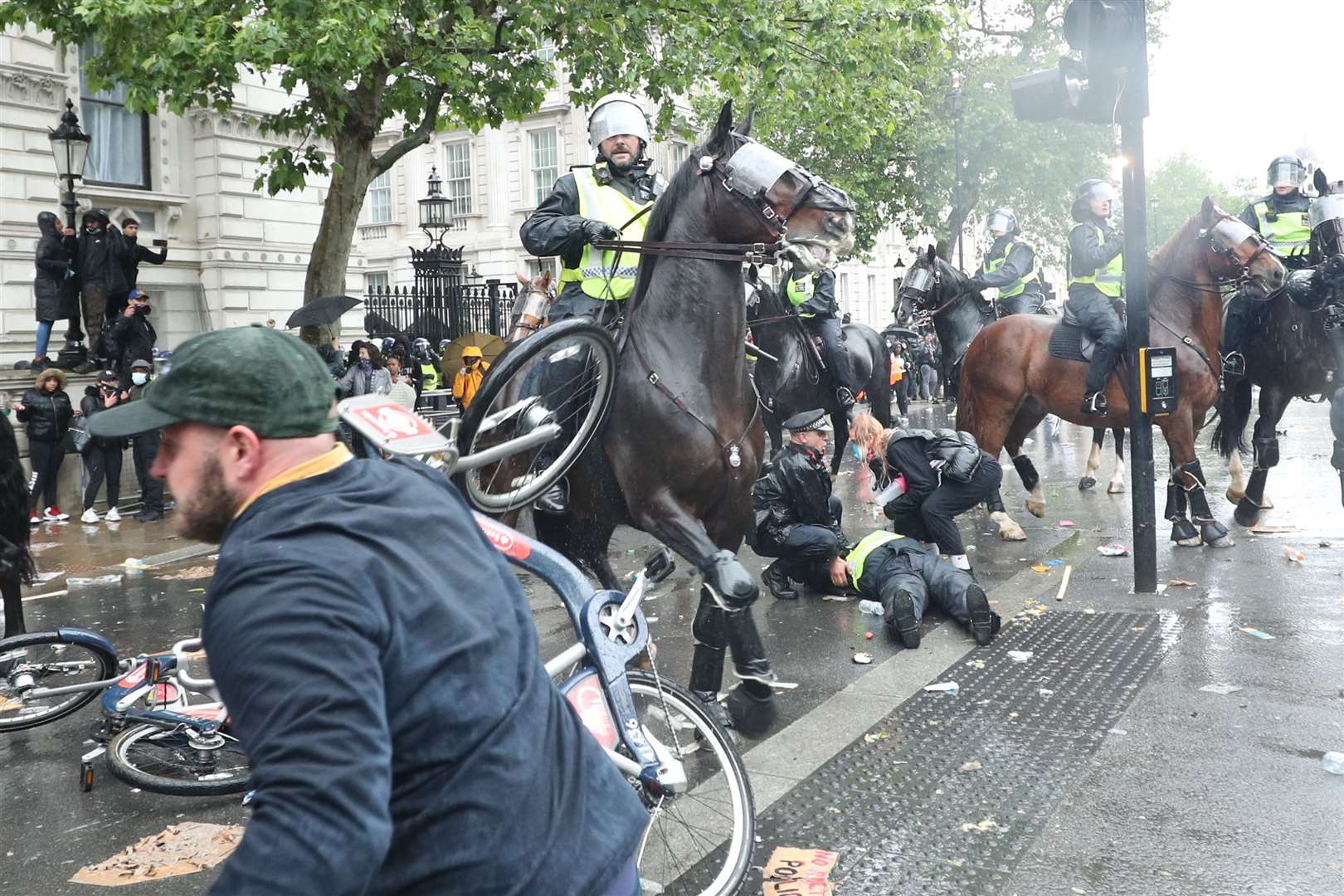 Bikes were thrown at mounted police during the clashes (Yui Mok/PA)