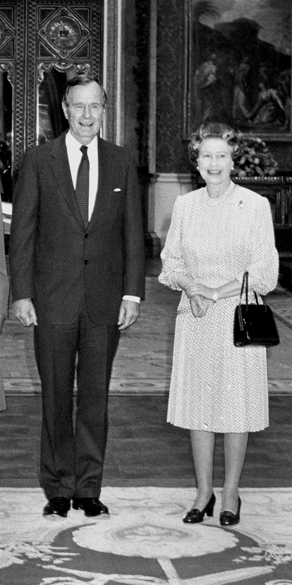 George Bush with the Queen in the Picture Room at Buckingham Palace (PA)