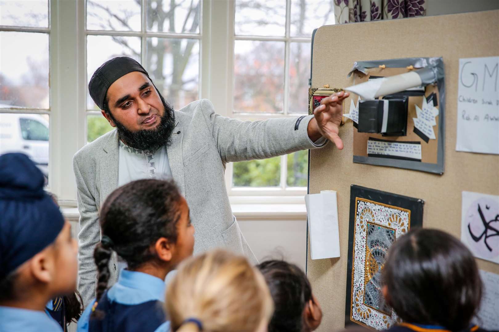 Umair Zulfiguar talks to the pupils from Bronte School