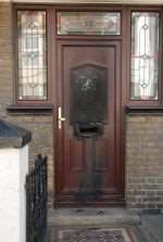 Damage to the front door of the house in St Georges Avenue, Sheerness